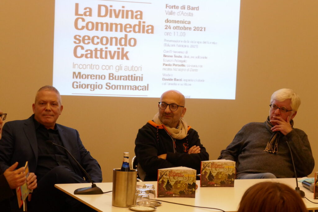 Ai lati i due autori Moreno Burattini e Giorgio Sommacal e al centro Davide Barzi