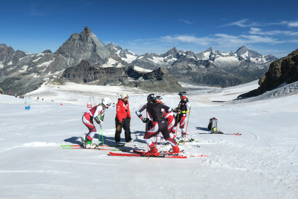 Team di professionisti durante allenamenti estivi