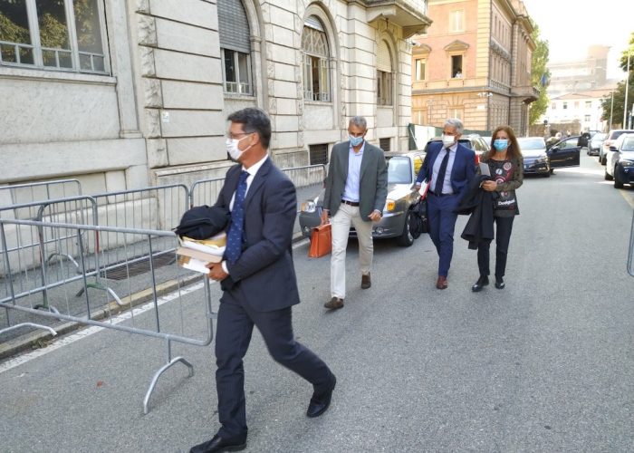 Il pm Stefano Castellani, seguito dal pm Valerio Longi e dal procuratore di Torino Anna Maria Loreto.
